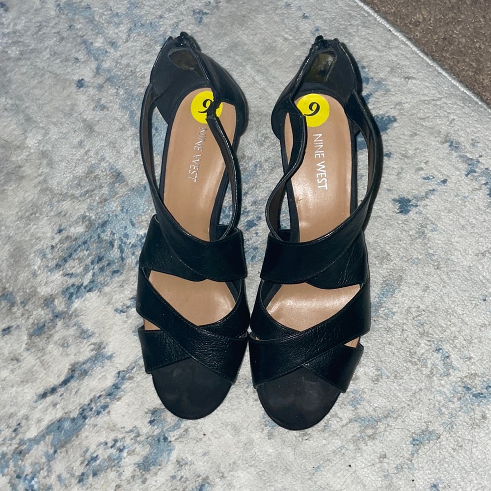 Women’s black strapped heels, genuine leather, only worn once.